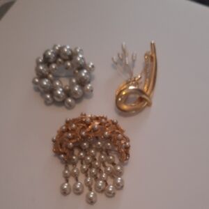 Elegant Silver and Gold Brooch Set